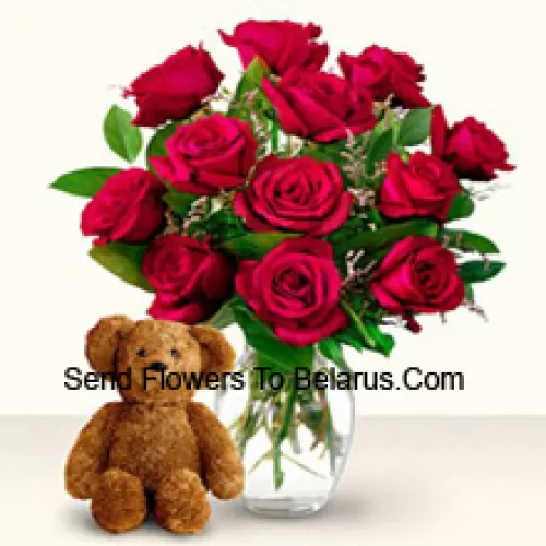 11 Red Roses With Some Ferns In A Glass Vase Along With A Cute 12 Inches Tall Brown Teddy Bear