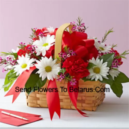 A Beautiful Arrangement Of White Gerberas And Red Carnations With Seasonal Fillers