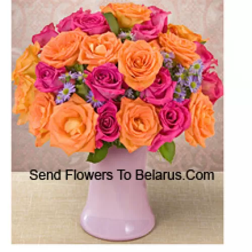 15 Pink And 10 Orange Roses With Seasonal Fillers In A Glass Vase