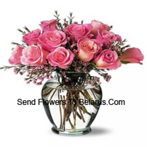 11 Pink Roses With Some Ferns In A Vase