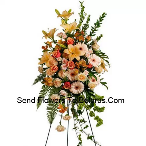 A Beautiful Sympathy Flower Arrangement That Comes With A Stand