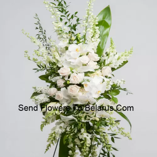 A Beautiful Sympathy Flower Arrangement That Comes With A Stand