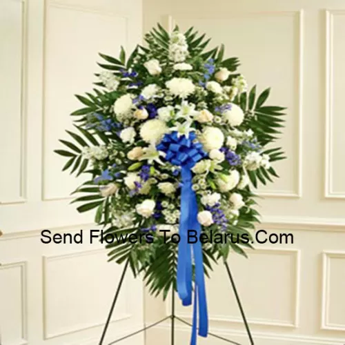 A Beautiful Sympathy Flower Arrangement That Comes With A Stand