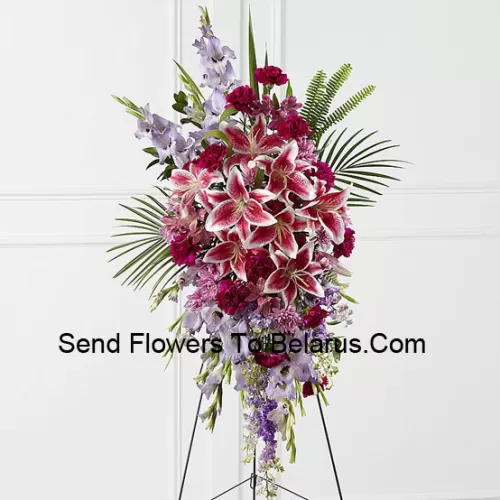 A Beautiful Sympathy Flower Arrangement That Comes With A Stand