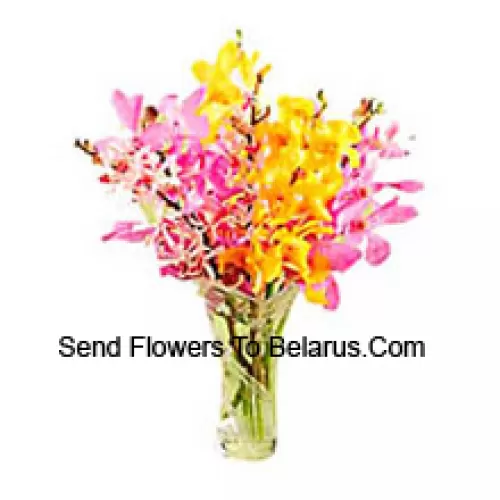 Mixed Colored Orchids In A Vase