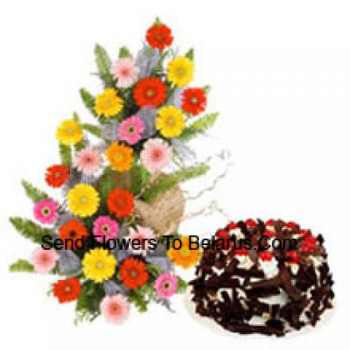 25 Gerberas con tarta de chocolate crujiente de 1 kg