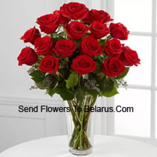 19 Red Roses With Some Ferns In A Vase