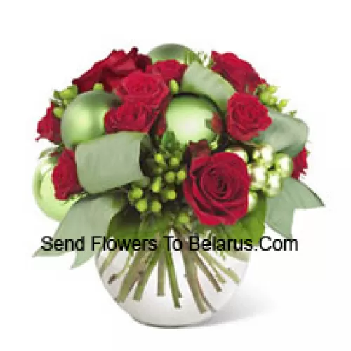 This new holiday bouquet combines festive red roses, spray roses and more with bright green ornaments and seasonal accents for a classic look with a contemporary new twist!  (Please Note That We Reserve The Right To Substitute Any Product With A Suitable Product Of Equal Value In Case Of Non-Availability Of A Certain Product)